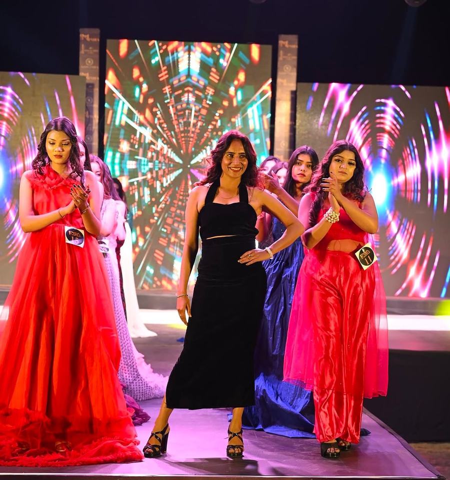 Pratibha Yadav opening a runway show with her models