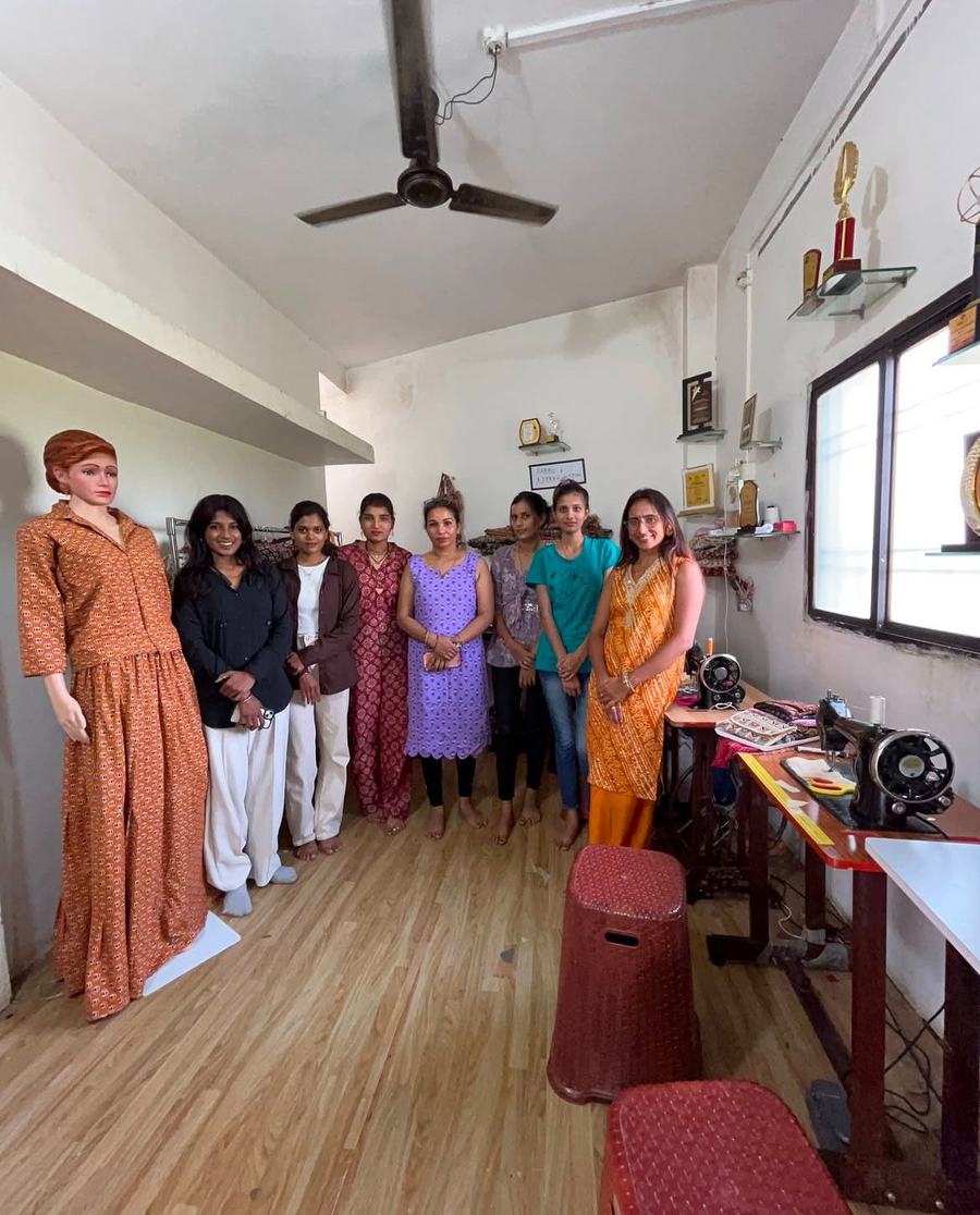 A batch of students in the Pratibha Fashions studio